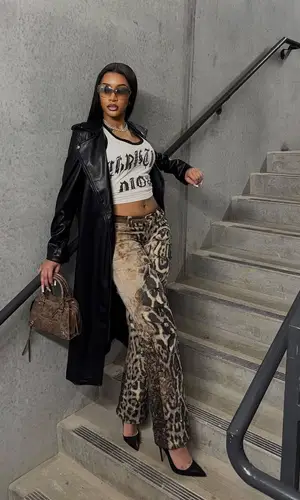 Lakeyah’s Outfit in Dior Top, FashionNova Bag & Christian Louboutin Sandals (2025)