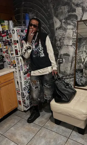 Quavo wearing Chrome Hearts scarf