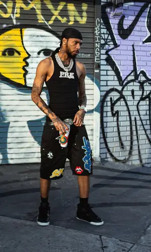 Key Glock wearing Chrome Hearts shorts