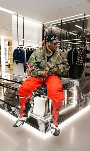 Future wearing Balenciaga boots