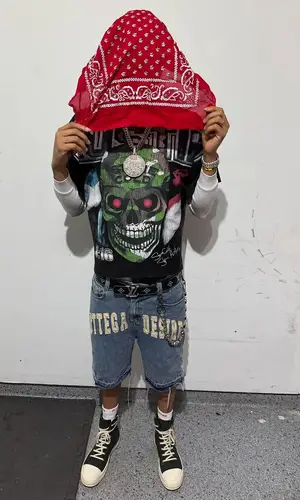 Stunna 4 Vegas wearing Supreme sock
