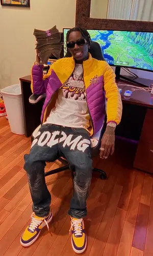 Soulja Boy’s Outfit in Soulja Boy Merch T-Shirt, Cartier Watch & Balenciaga Eyewear (2025)