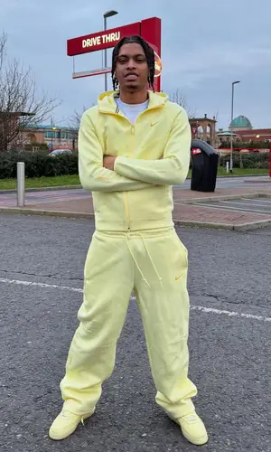Nemzzz wearing Nike pants