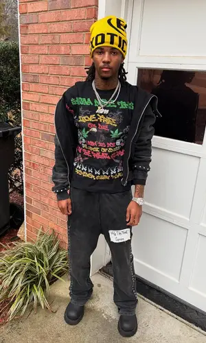 Lil Darius wearing Exotic Members Club hat
