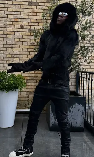 Rema wearing Prada jacket