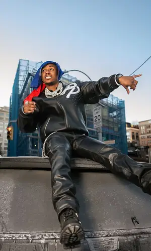 Rich The Kid wearing Patek Philippe watch