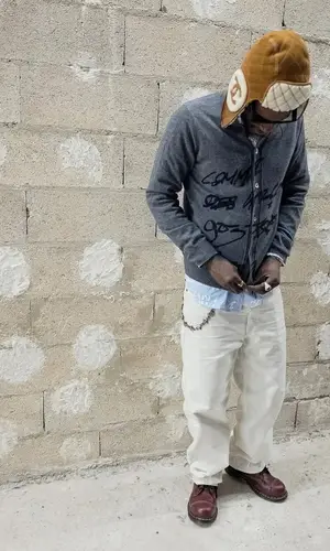 ASAP Nast’s Outfit in Ray-Ban Eyewear, Louis Vuitton Jewelry & Chanel Hat (2025)
