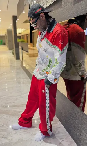 Jim Jones wearing Casablanca shirt