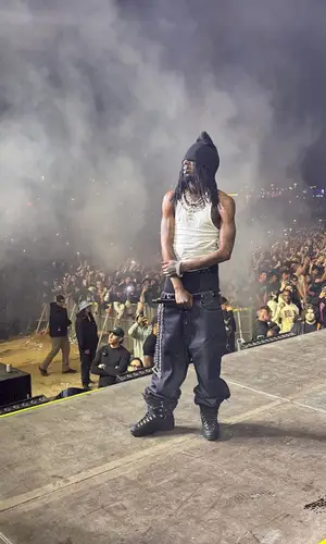 Playboi Carti wearing Playboi Carti Merch cap
