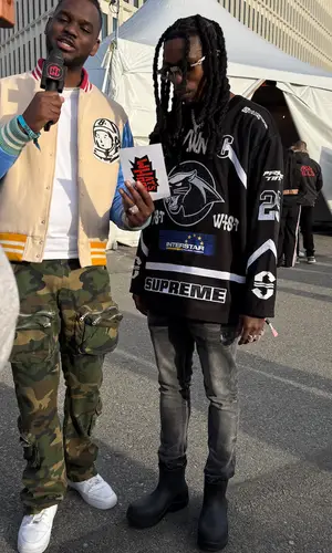 DaBoii wearing Supreme jersey