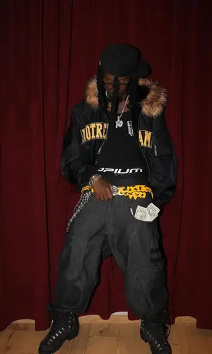Playboi Carti wearing Playboi Carti Merch cap