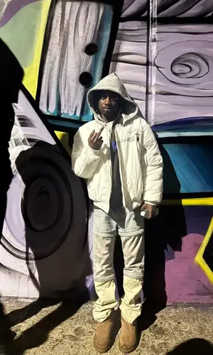 Bear1Boss wearing Balenciaga jeans