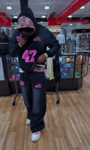 DJ Swamp Izzo wearing Physical Culture cap