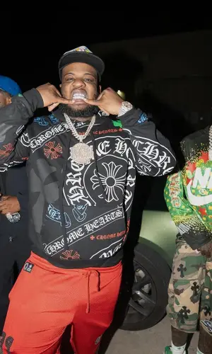 Maxo Kream’s Outfit in Matty Boy Shorts, Jordan Sneakers & Chrome Hearts Cap (2025)