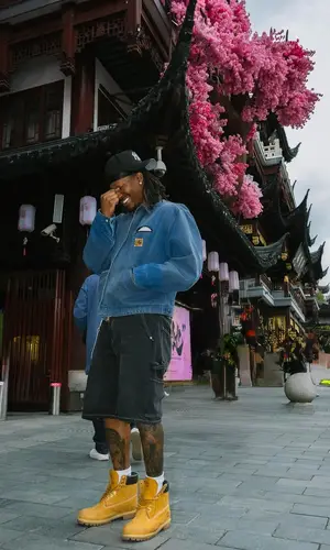 Duke Dennis wearing Louis Vuitton boots