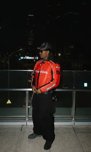 Duke Dennis wearing Louis Vuitton boots