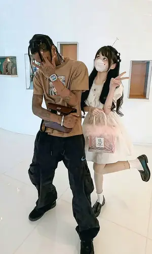 Travis Scott wearing Hermes bag