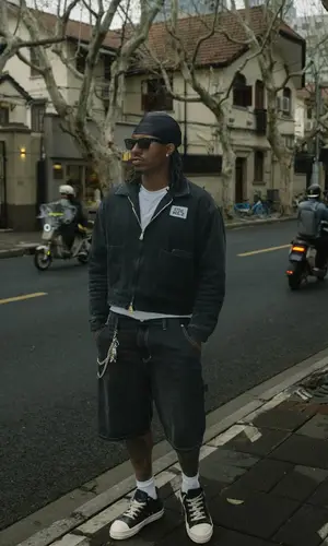 Duke Dennis wearing Carhartt shorts