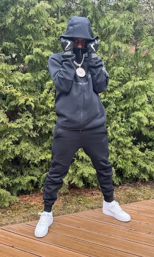 Popcaan’s Outfit in Nike Hoodie (2025)