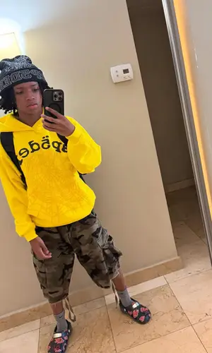 BabyChiefDoit wearing Crocs sandal