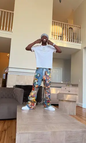 2xrakai wearing Nike sneakers
