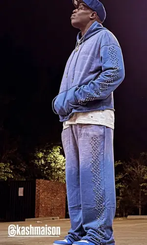 DJ Swamp Izzo wearing Nike sneakers