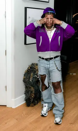 Rylo Rodriguez wearing Louis Vuitton jewelry