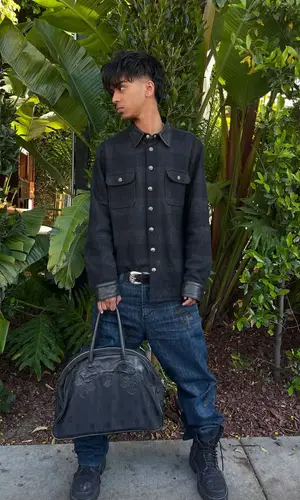 Yung Fazo wearing Balenciaga boots