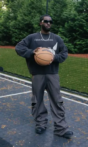 Lil Dann’s Outfit in Enfants Riches Deprimes Sweatshirt, Chrome Hearts Eyewear & Wilson (2025)