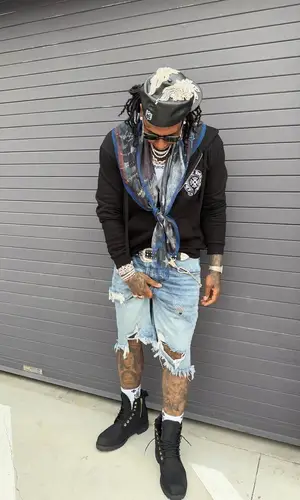 Moneybagg Yo’s Outfit in Chrome Hearts Hoodie, Mnml Shorts & Timberland Boots (2025)