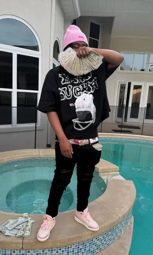 YN Jay wearing Louis Vuitton belt