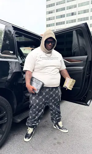 Enphamus wearing Prada eyewear