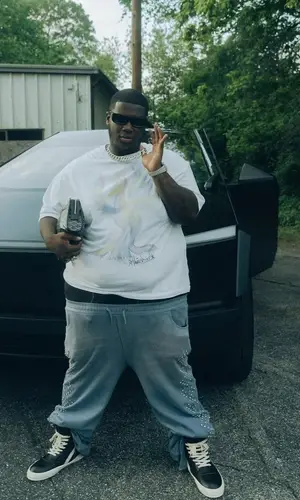 Enphamus wearing Prada eyewear