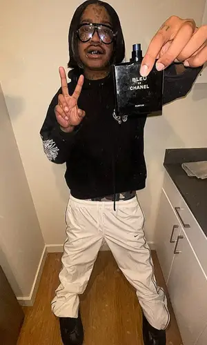 Lil Tracy’s Outfit in Chrome Hearts Hoodie, Tom Ford Eyewear & Chanel (2025)