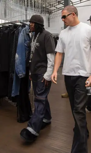 Don Toliver’s Outfit in Don Toliver Merch Top, Balenciaga Boots & Chrome Hearts Hat (2025)