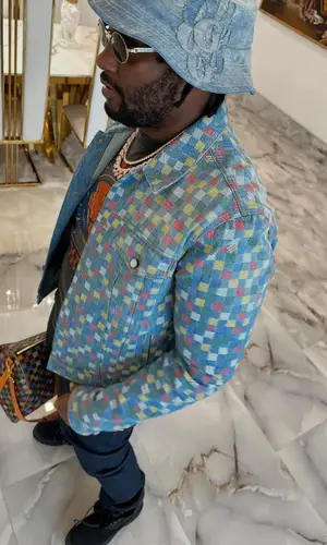 Peezy wearing Louis Vuitton belt