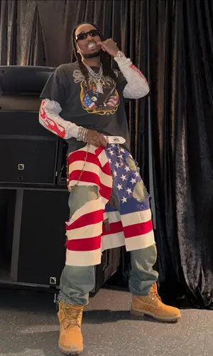Quavo wearing StarChain World jewelry