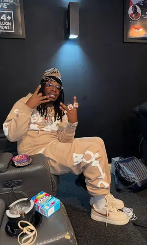 YN Jay wearing Balenciaga hat