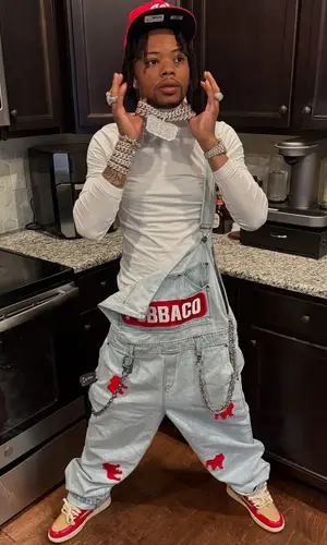 Lil Migo’s Outfit in Pubbaco Pants, Reves Paris Sneakers & New Era Cap (2025)