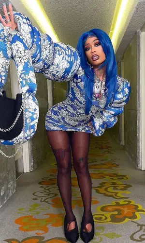 TiaCorine wearing Balenciaga boots