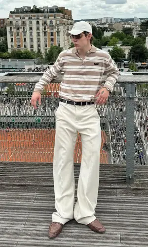 The Kid Laroi’s Outfit in Saint Laurent Boots, Miu Miu Eyewear & Polo Ralph Lauren Cap (2025)