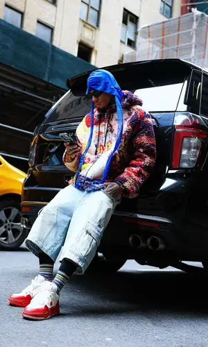 NLE Choppa’s Outfit in Loewe Jacket, Rta Shorts & Prada Eyewear (2025)
