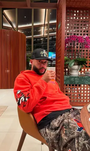 Memphis Depay wearing Supreme shorts