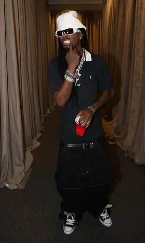 Playboi Carti wearing Playboi Carti Merch shirt