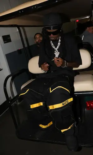 Playboi Carti wearing Amazon scarf