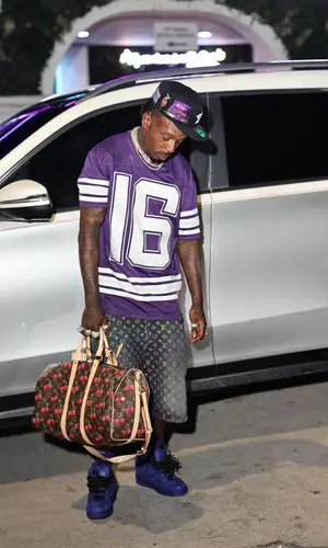 Sauce Walka’s Outfit in Cough Syrup Jersey, Louis Vuitton Shorts & Takashi Murakami Bag (2025)