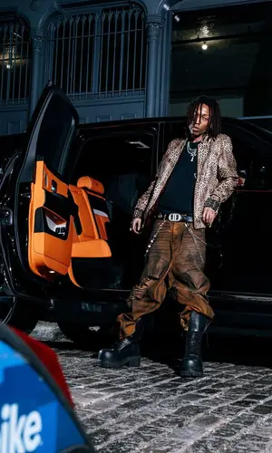 Lil Tecca wearing Chrome Hearts top