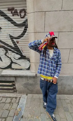 Cochise wearing Walter van Beirendonck cap