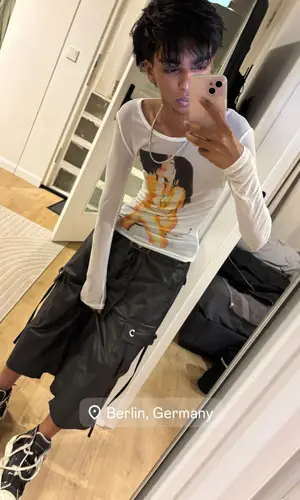 Yung Fazo wearing Fe3c shorts