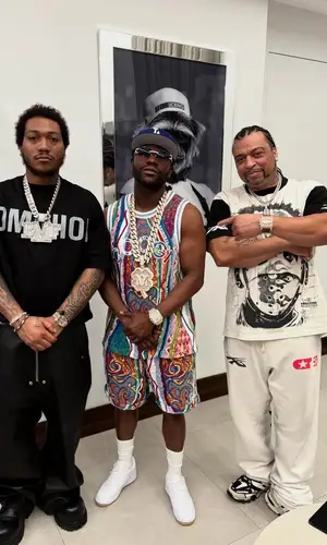 Lil Meech wearing Balenciaga boots